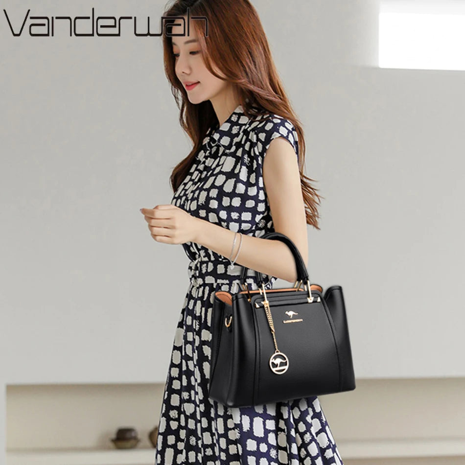 “Luxury women’s designer leather handbag, 3 layers, large capacity, shoulder crossbody tote.”