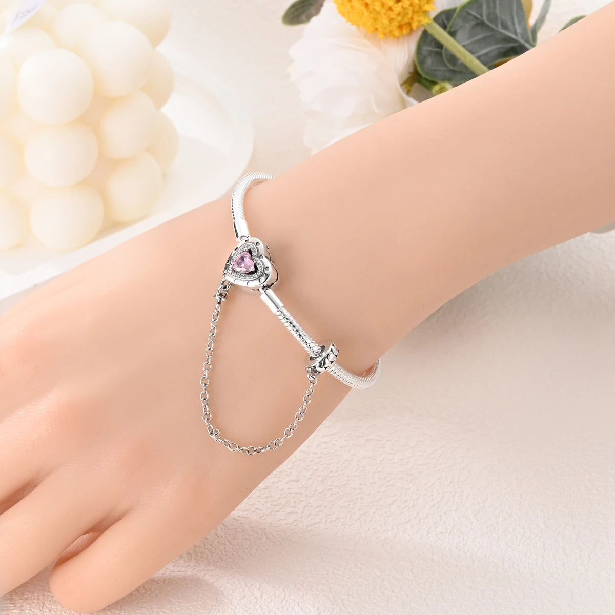 “Silver plated charm bracelet with safety chain, snake chain fits beads, perfect gift.”