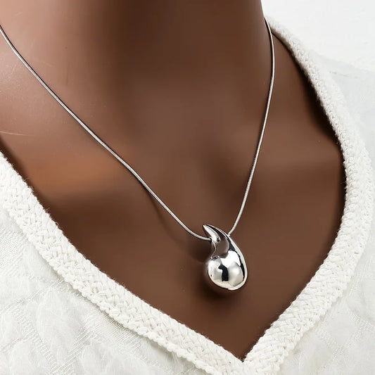 “3Pcs Gold-Plated Teardrop Necklace & Earrings Set - Trendy Jewelry.”