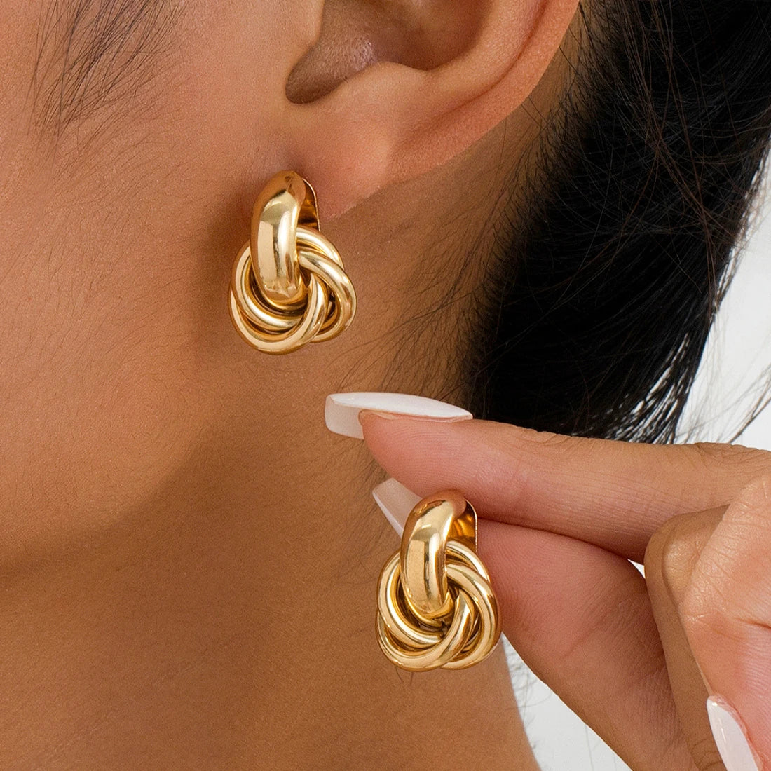 “Stainless Steel Chunky Hoop Earrings - Gold Double Ring Geometric Design.”