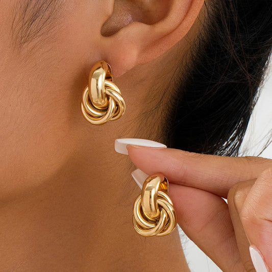 “Stainless Steel Chunky Hoop Earrings - Gold Double Ring Geometric Design.”