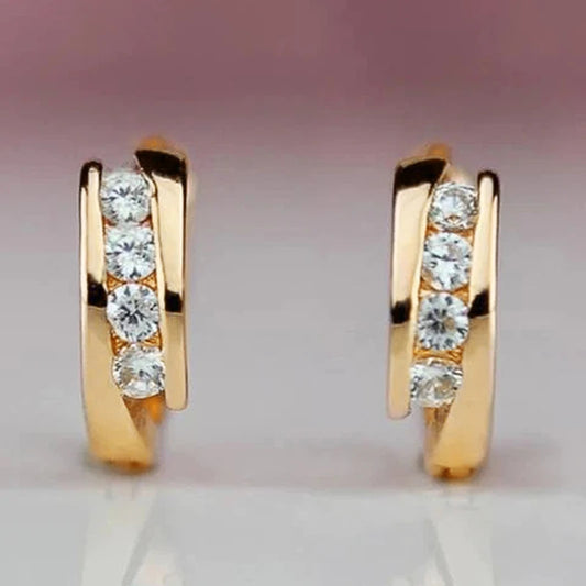 “Gold hoop earrings for women, daily wear, elegant, versatile statement jewelry.”
