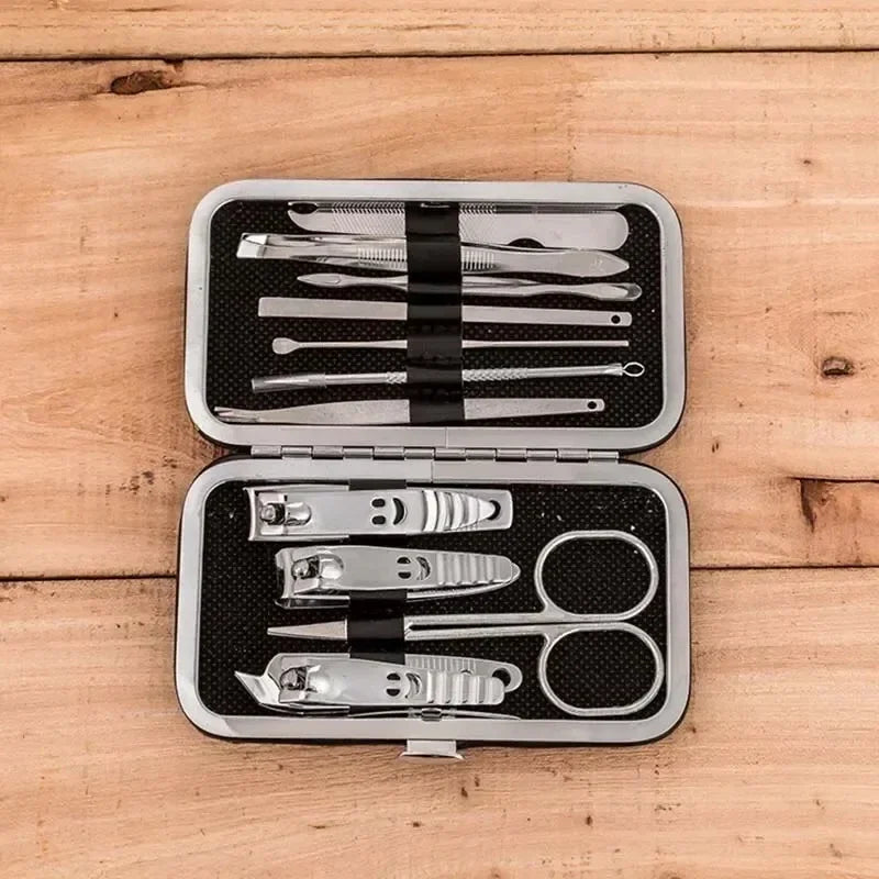 “Set of 11 happy face nail tools including file and scissors.”