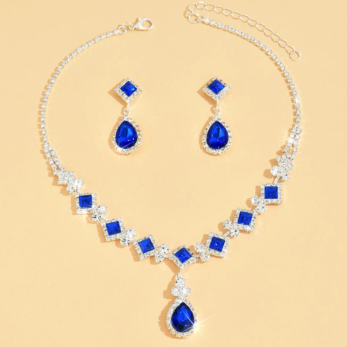 “3-piece claw chain geometric droplet earrings and necklace set, elegant wedding party gift.”