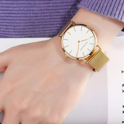 “Rose gold women’s bracelet watch, stainless steel mesh, simple, Japanese quartz.”