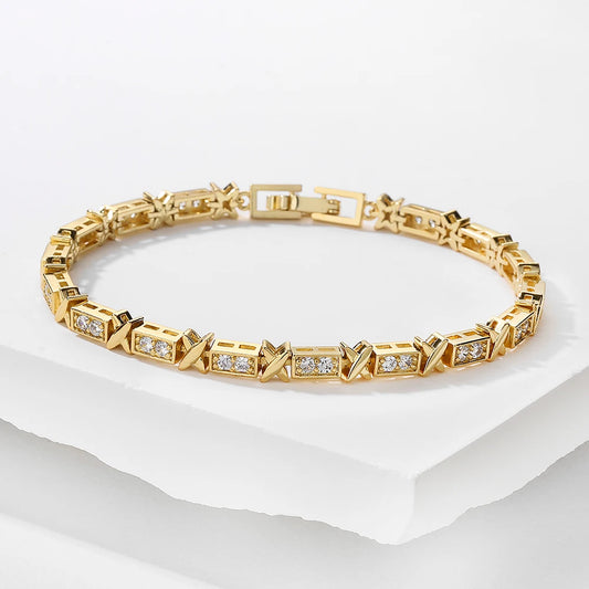 “Elegant X Cross Zirconia Charm Bracelet for Women and Men, Luxury Wedding Party Jewelry.”