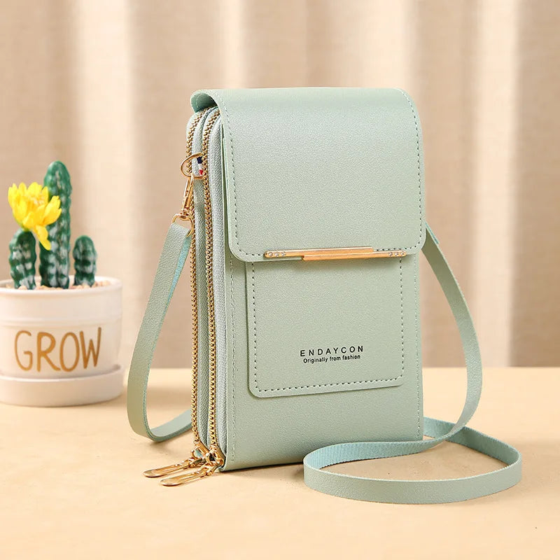 “Women’s soft leather crossbody handbag with touch screen phone purse, small wallet.”