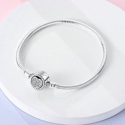 “MULA silver plated heart clasp snake chain bracelet, fits original charms, perfect gift.”
