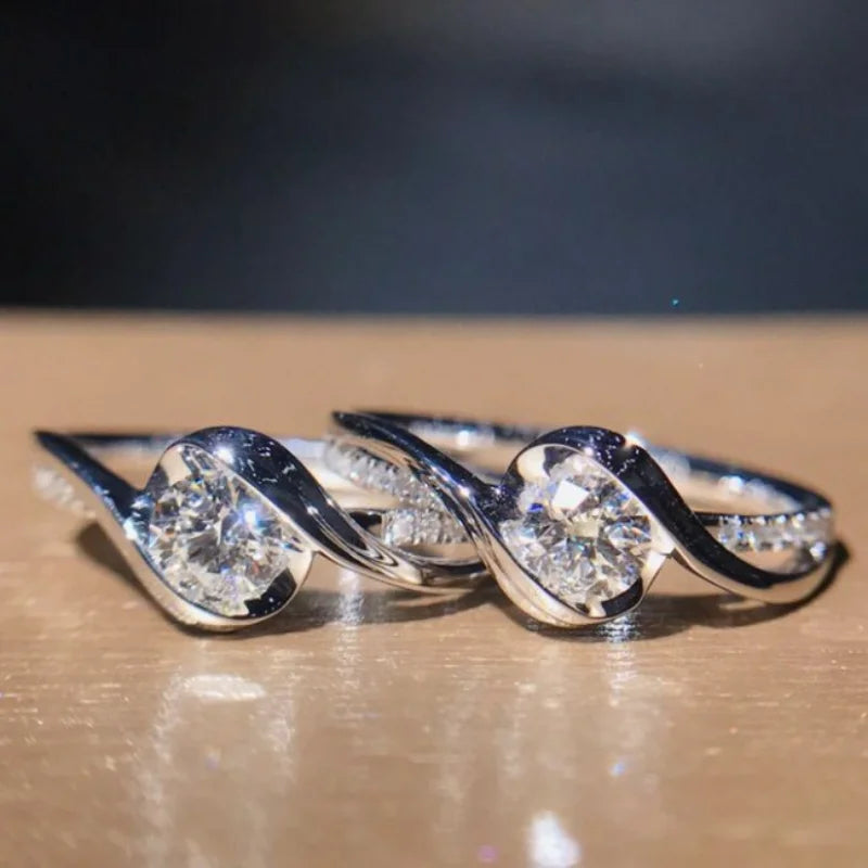 “Elegant 925 silver promise ring with solitaire zircon, perfect bridal jewelry.”