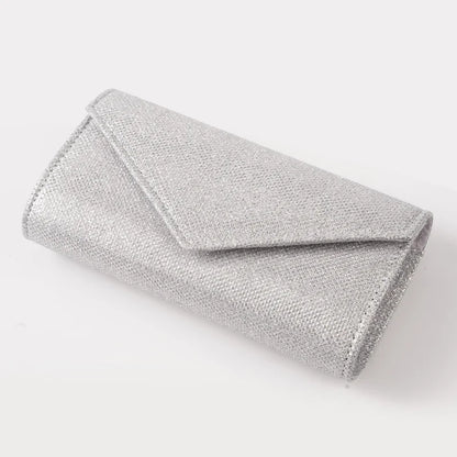“Glitter Evening Bag for Women, Shiny Silver Party Clutch with Chain Strap.”