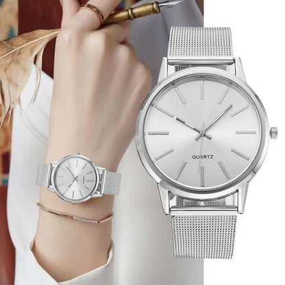 “Luxury Women’s Quartz Watch, Minimalist Silver Design, Stylish Business Accessory.”