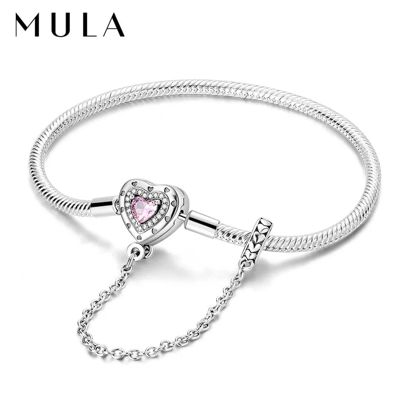 “Silver plated charm bracelet with safety chain, snake chain fits beads, perfect gift.”