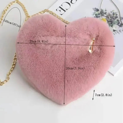 “Heart-shaped fluffy handbag, chain crossbody, cute zipper, perfect for Valentine’s Day.”