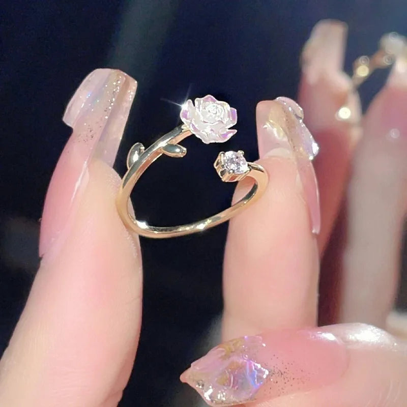 “Luxury Zircon Flower Rings for Women - Rose, Cherry Blossom, Tulip Design, Adjustable.”