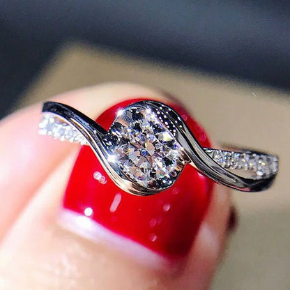 “Elegant 925 silver promise ring with solitaire zircon, perfect bridal jewelry.”