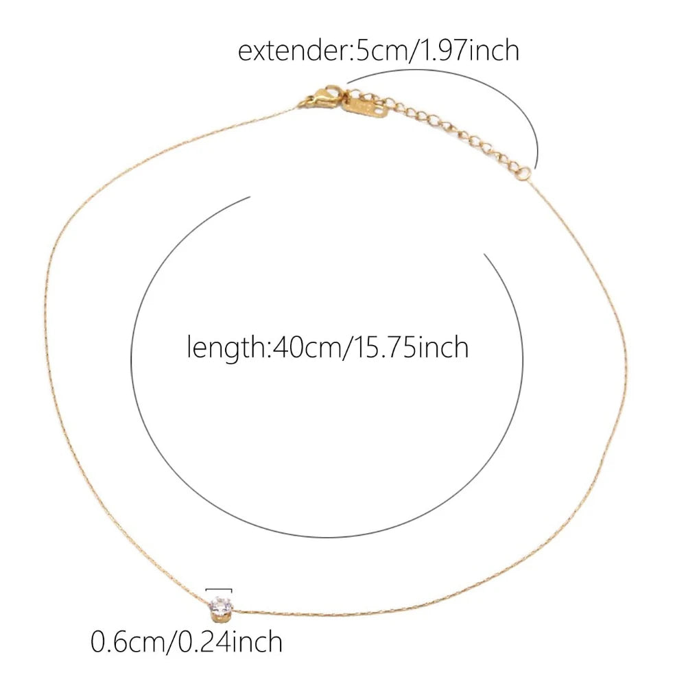 “Stainless Steel Gold Plated Zircon Necklace - Dainty Minimalist Clear CZ Charm for Women.”