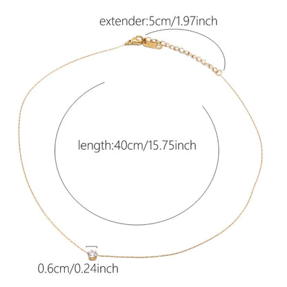 “Stainless Steel Gold Plated Zircon Necklace - Dainty Minimalist Clear CZ Charm for Women.”