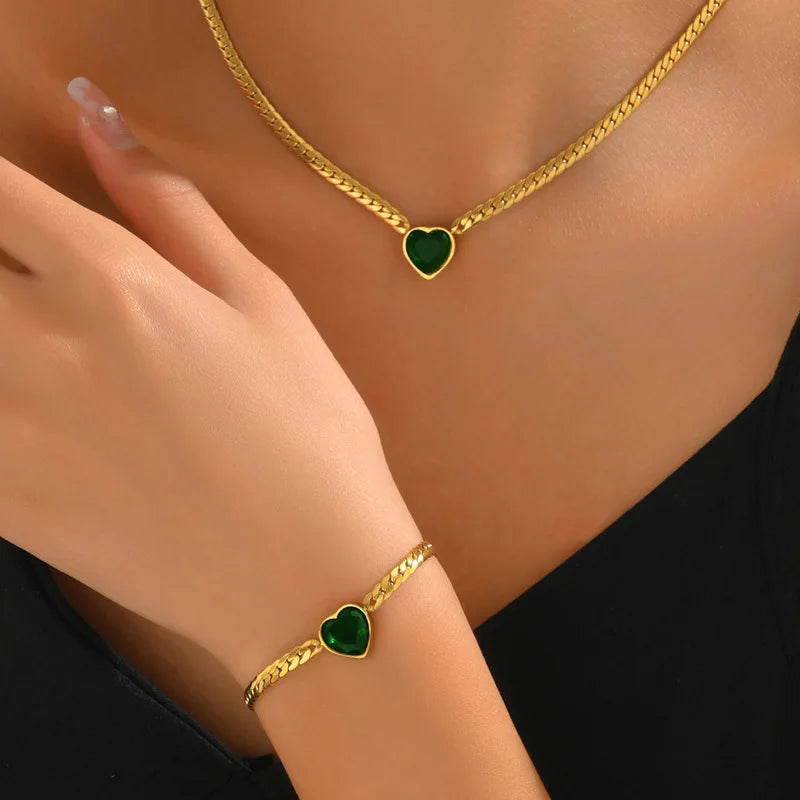 “Stainless Steel Heart-Shaped Green & White Crystal Pendant Necklace & Bracelet Set.”