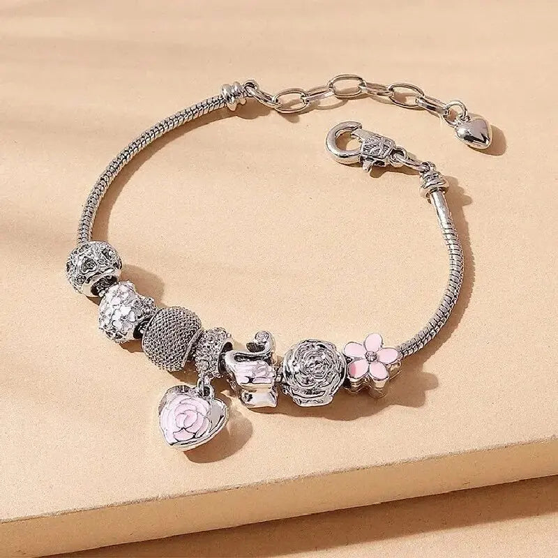 “Fashion rose and swan charm bracelet, elegant accessory for parties or daily wear.”