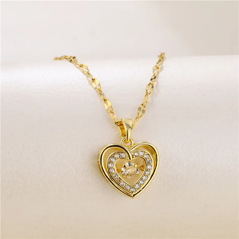 “Cute Beating Heart Crystal Pendant Necklace - Korean Fashion Stainless Steel Clavicle Chain.”