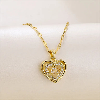 “Cute Beating Heart Crystal Pendant Necklace - Korean Fashion Stainless Steel Clavicle Chain.”