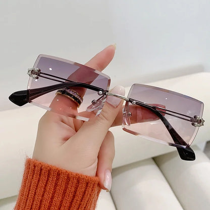 “Luxury rectangle rimless sunglasses, gradient colors, stylish unisex design.”