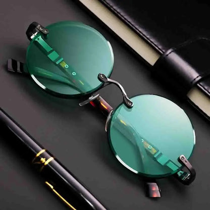 “Classic rimless sunglasses, retro round design, crystal green lenses for outdoor wear.”