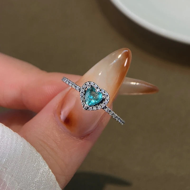 “Shiny Zircon Heart Ring - 925 Sterling Silver Luxury Jewelry for Engagements & Weddings.”