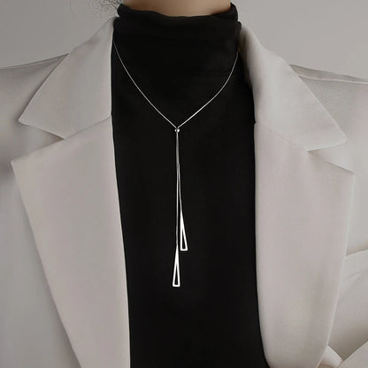 “Tassel Necklace for Women - Gold/Silver Triangle Pendant Long Necklace.”
