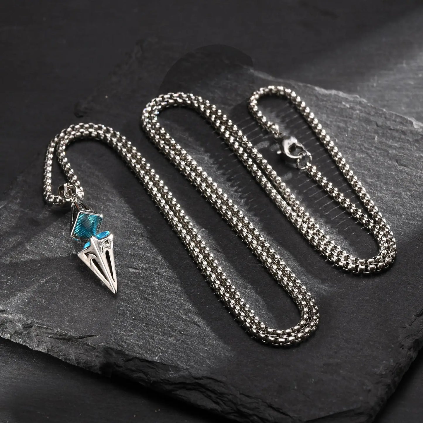 “Stylish Blue Stone Necklace for Men & Women - Stainless Steel Geometric Pendant.”