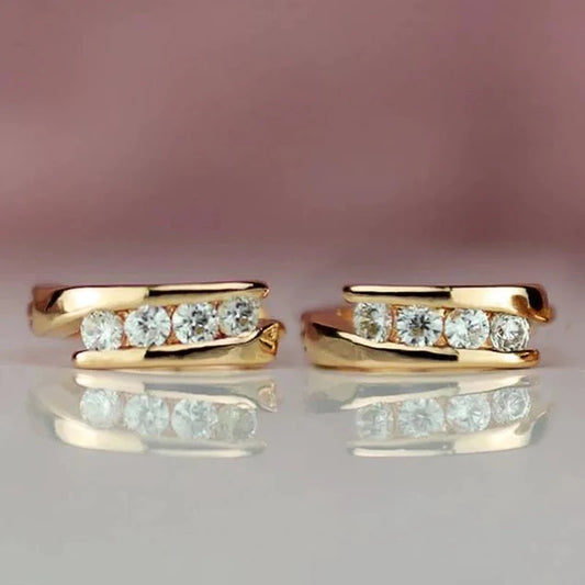 “Gold hoop earrings for women, daily wear, elegant, versatile statement jewelry.”
