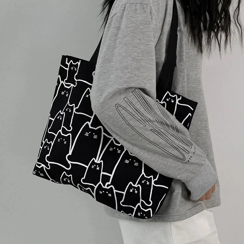 “Canvas tote bag for women, cute cat design, zipper, small Japanese style.”