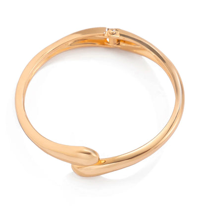 “Ingemark Creative Water Drop Metal Bangle - Gold Geometric Twisted Bracelet for Women.”