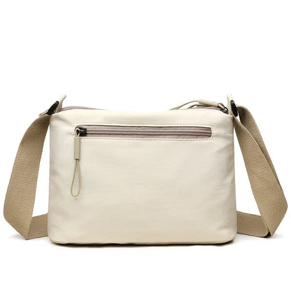 “3-Pocket High Capacity Canvas Shoulder Bag, Crossbody Purse, Ideal for Mothers”