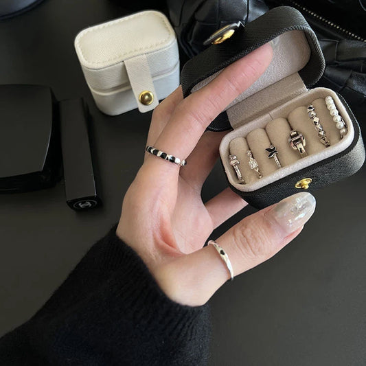 “Mini Portable Jewelry Storage Bag Leather Travel Box for Rings, Necklaces, Earrings.”