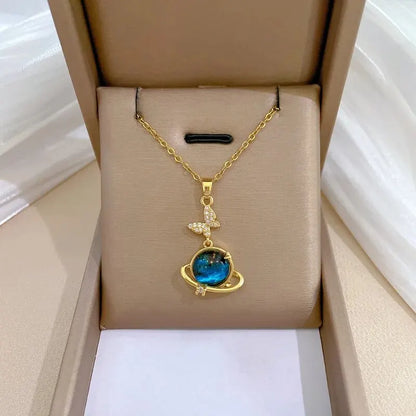 “Luxury gold titanium steel necklace with planet, moon, astronaut pendants.”