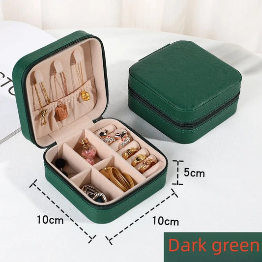 “Portable mini jewelry storage box, PU leather, for earrings, necklaces, rings.”