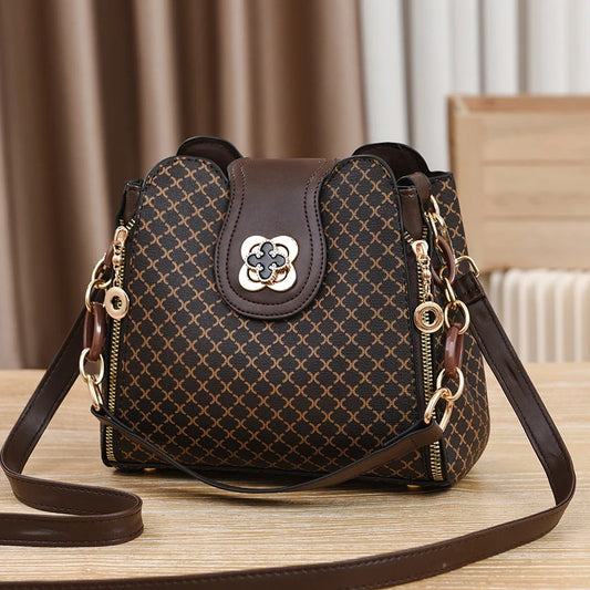 “Luxury bucket handbag for women, check print, spacious design, crossbody style.”