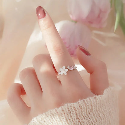 “Luxury Zircon Flower Rings for Women - Rose, Cherry Blossom, Tulip Design, Adjustable.”