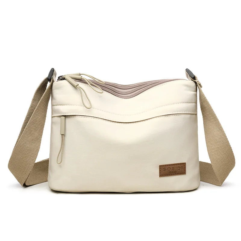 “3-Pocket High Capacity Canvas Shoulder Bag, Crossbody Purse, Ideal for Mothers”