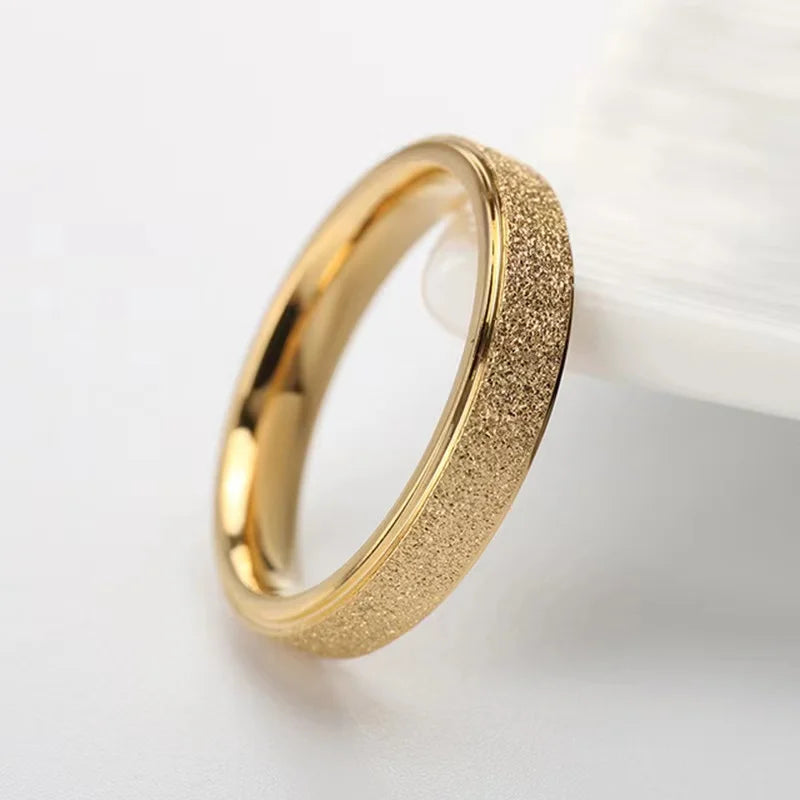 “SUNIBI Frosted Stainless Steel Ring - Simple Gold Color Wedding Jewelry for Women.”