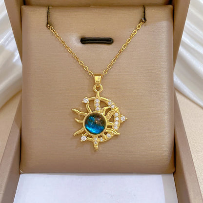 “Luxury gold titanium steel necklace with planet, moon, astronaut pendants.”