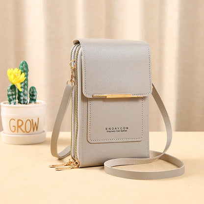 “Women’s soft leather crossbody handbag with touch screen phone purse, small wallet.”