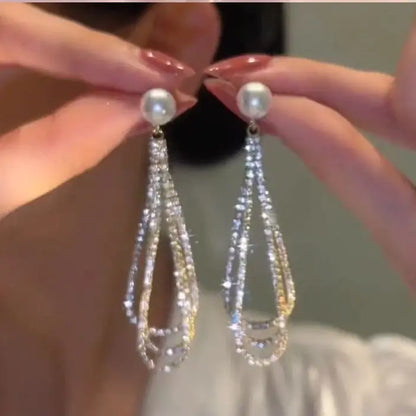 “Korean Tassel Pearl Drop Earrings - Luxury Gold Wedding Jewelry.”