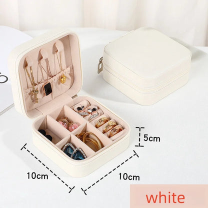 “Portable mini jewelry storage box, PU leather, for earrings, necklaces, rings.”