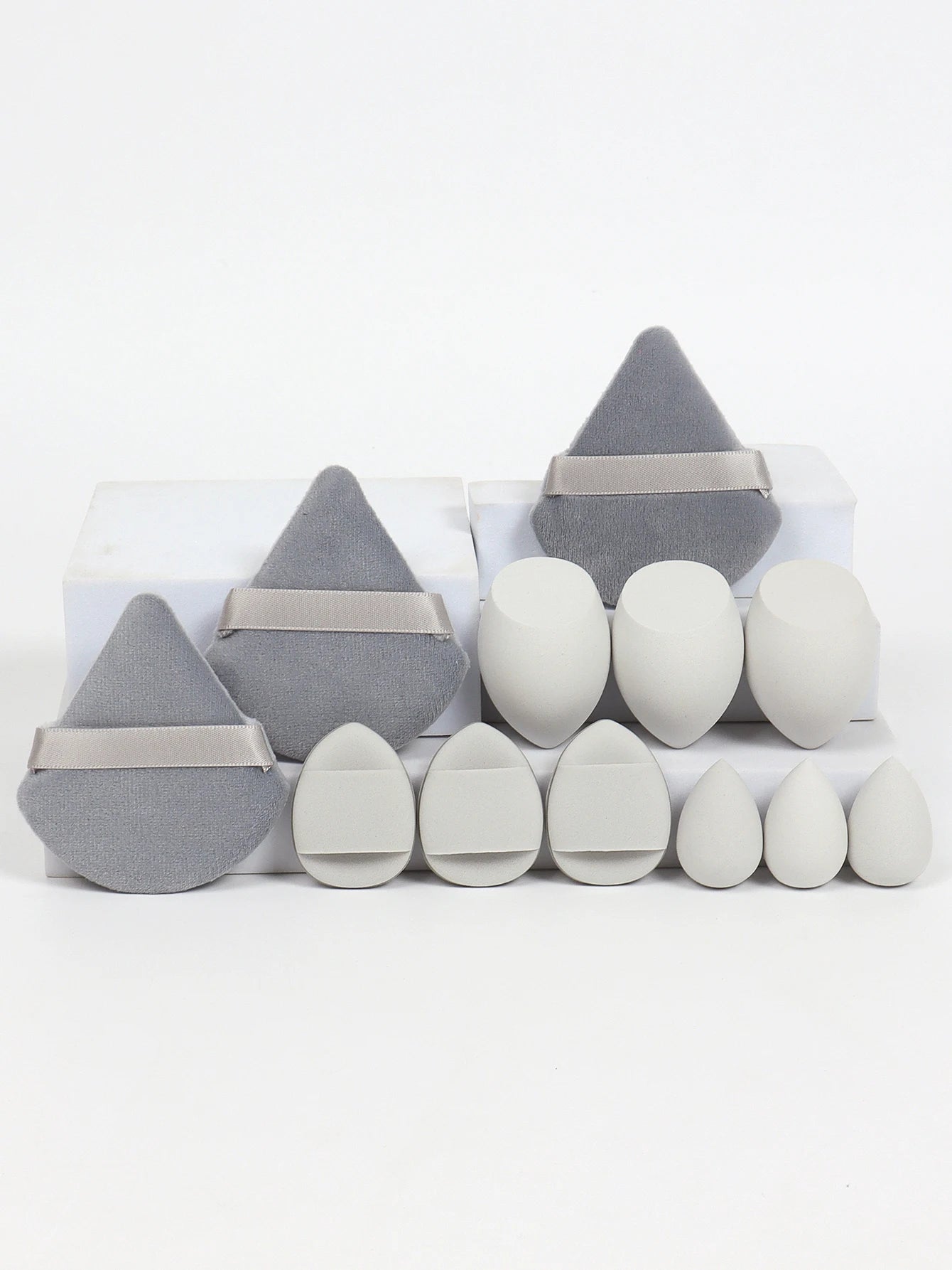 “12-piece makeup sponge set: powder puffs, air cushion puffs, and beauty eggs.”