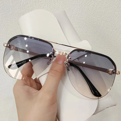 “Metal half-frame women’s sunglasses, classic double-beam design for outdoor fashion.”