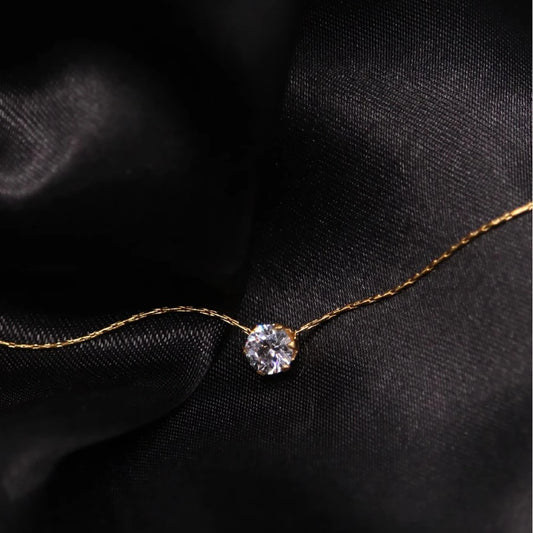 “Stainless Steel Gold Plated Zircon Necklace - Dainty Minimalist Clear CZ Charm for Women.”