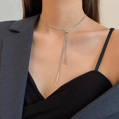 “Tassel Necklace for Women - Gold/Silver Triangle Pendant Long Necklace.”