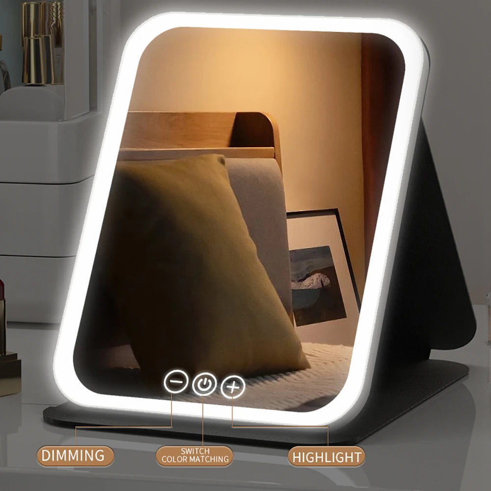 "3 Colors dimmable LED makeup mirror with touch screen, foldable, rechargeable, travel-friendly."